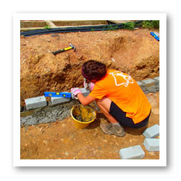 Volunteers working with Camps International